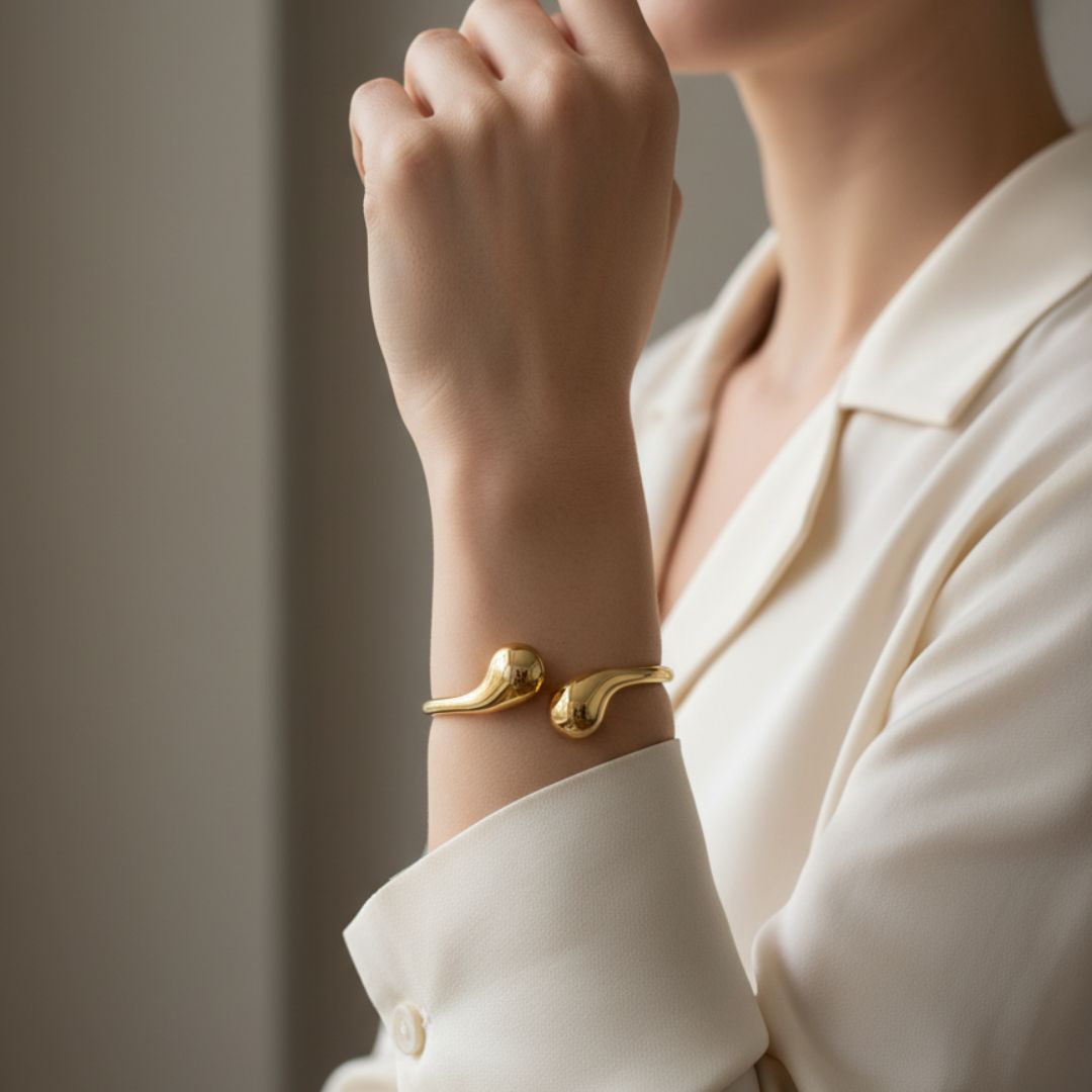 Modern Polished Gold Double Ball End Bangle